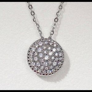 Silver and cubic zirconia round necklace
